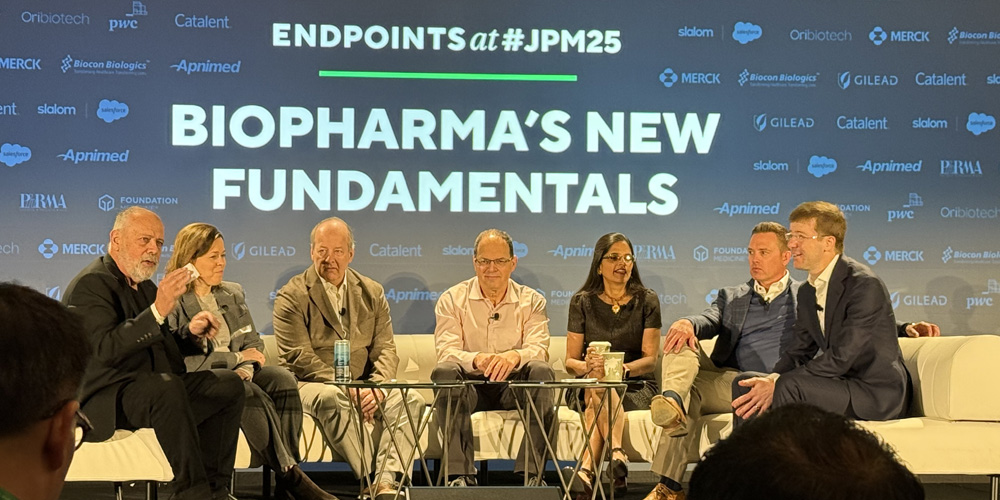 John Carroll (Endpoints), Julie Rozenblyum (BMS), Sander Slootweg (Forbion), Aharon Gal (Novartis), Aradhana Sarin (AstraZeneca), Marck McKenna (Mirador Therapeutics), and Roel van den Akker (PwC US) discuss the future of dealmaking in 2025 during an Endpoints News JPM panel.