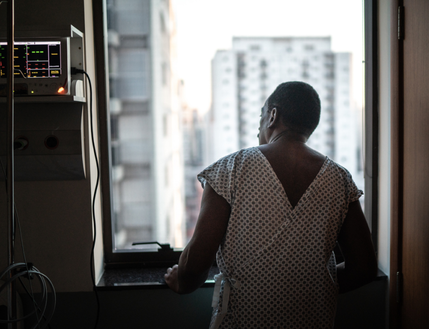 Man looking on the window